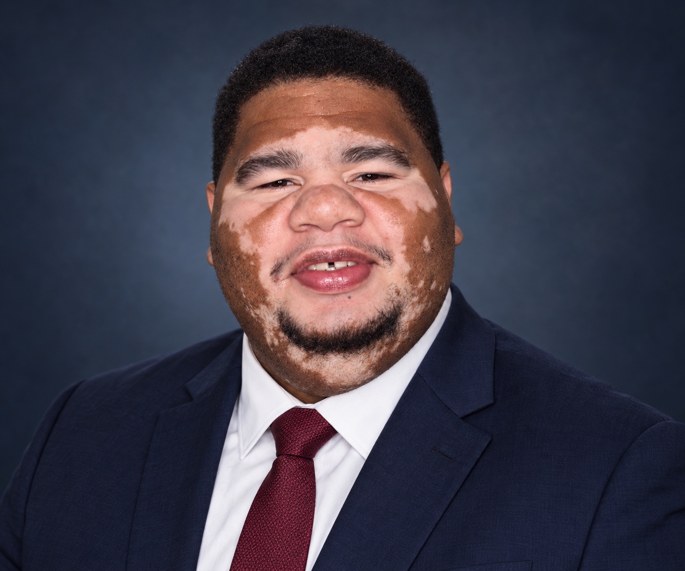 Julien Serrano-O’Neil, official headshot